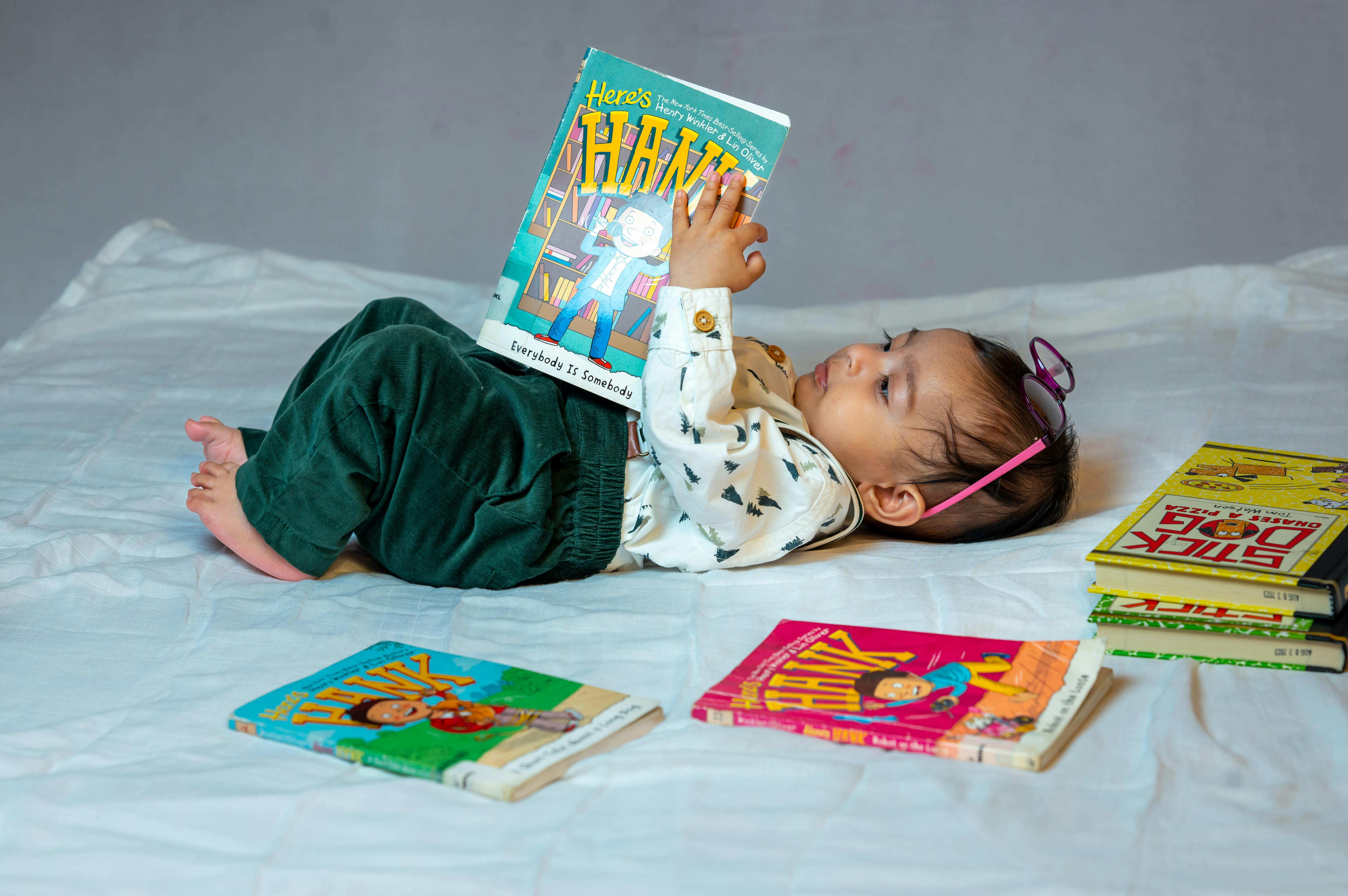 toddler with books