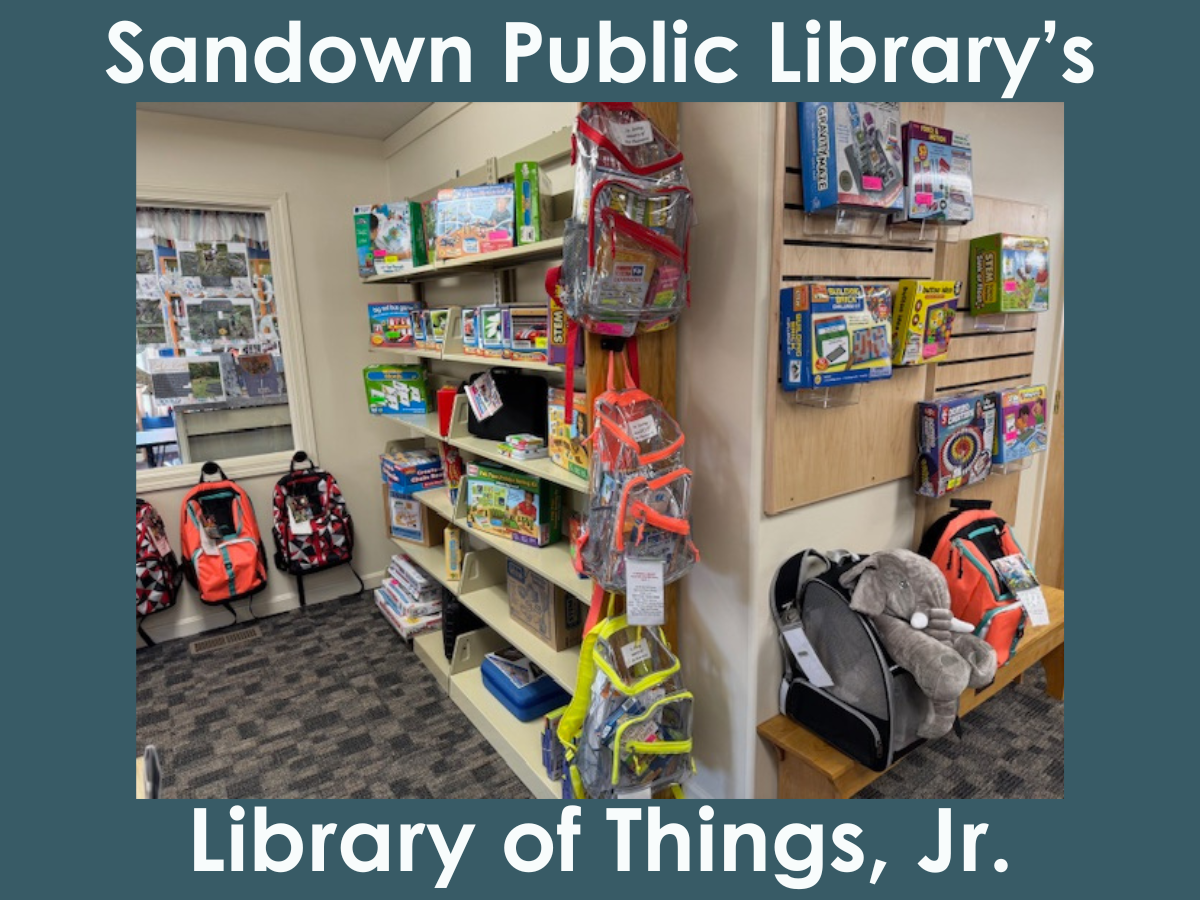 Two wall shelves full of games, puzzles, building sets, engineering kits, backpack bundles and other STEAM-related items for checking out.