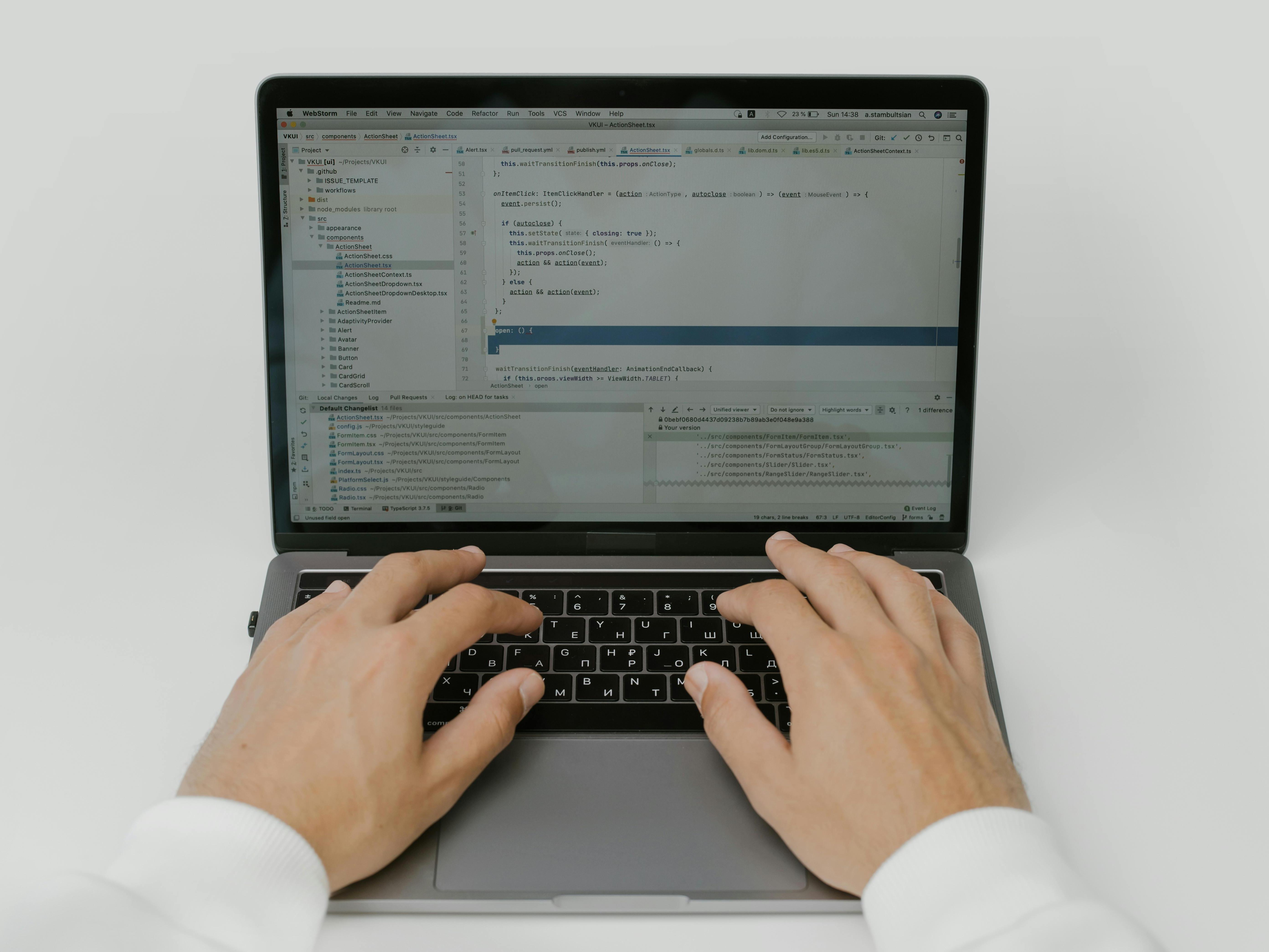 laptop with someone typing